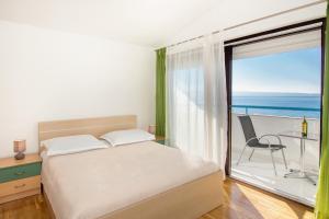 Apartments Zanic on The Beach客房内的一张或多张床位