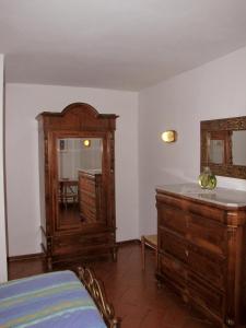 Postel nebo postele na pokoji v ubytování Residence Casprini da Omero
