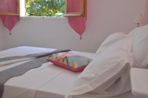 Letto o letti in una camera di Thijo Guadeloupe