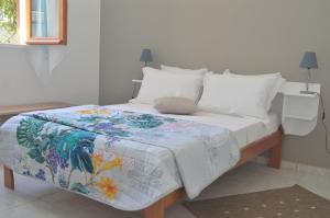 Letto o letti in una camera di Thijo Guadeloupe