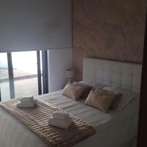 En eller flere senger på et rom på Oporto Guesthouse Ermesinde