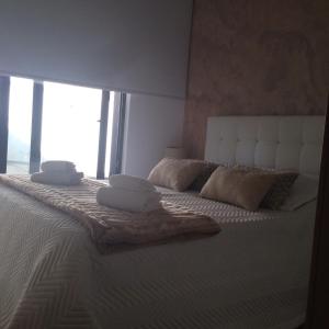 En eller flere senger på et rom på Oporto Guesthouse Ermesinde