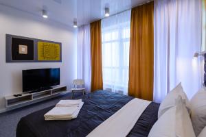 TV a/nebo společenská místnost v ubytování Partner Guest House Klovs'kyi