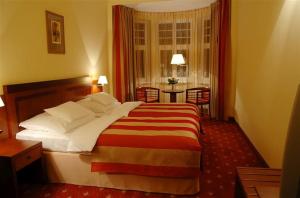 Postel nebo postele na pokoji v ubytování Hotel Villa