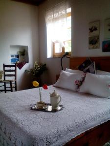 Posteľ alebo postele v izbe v ubytovaní Nightingale Cottage Pelion
