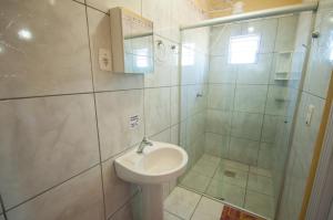 Koupelna v ubytování Pousada Jomar + 42 fotografií