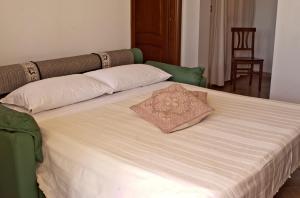 Postel nebo postele na pokoji v ubytování Agriturismo Sa Suerera