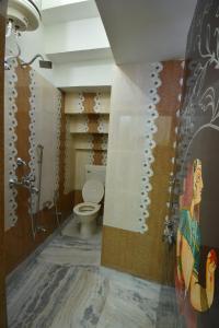 Et badeværelse på L G Guest House