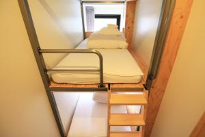 Postel nebo postele na pokoji v ubytování Wise Owl Hostels Shibuya