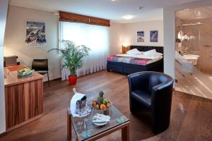 Postel nebo postele na pokoji v ubytování Hotel Ambassador