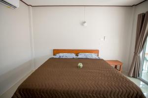 Postel nebo postele na pokoji v ubytování Lamai Resort