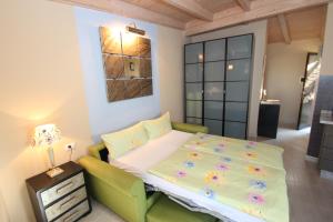 A bed or beds in a room at Studio Pablo Finca Montimar Még 37 kép