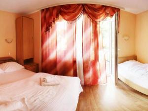 Postel nebo postele na pokoji v ubytování B&B Vila Raj