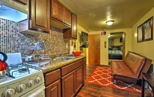 a kitchen with a sink and a stove at Two Bedroom Apartment - North East Bronx in Bronx