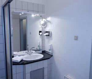 Koupelna v ubytování Wasserturm Hotel Mannheim + 37 fotografií