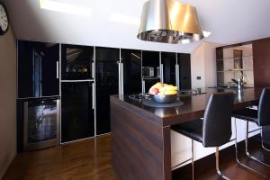 Kuchyňa alebo kuchynka v ubytovaní Unique Apartment Opatija