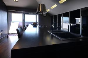Kuchyňa alebo kuchynka v ubytovaní Unique Apartment Opatija