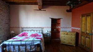 Voodi või voodid majutusasutuse Gîte Le Chapis toas