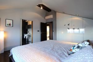Posteľ alebo postele v izbe v ubytovaní Unique Apartment Opatija