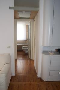 A bed or beds in a room at Riva Celeste