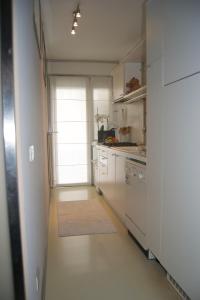 A kitchen or kitchenette at Riva Celeste