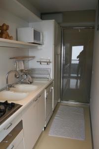 A kitchen or kitchenette at Riva Celeste