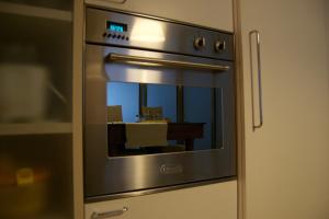 A kitchen or kitchenette at Riva Celeste