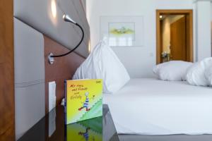Voodi või voodid majutusasutuse GORITSCHNIGGs Hotel toas