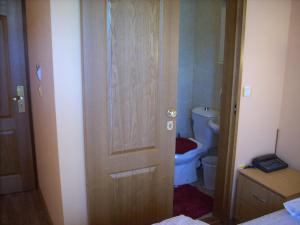 Postel nebo postele na pokoji v ubytování B&B Vila Raj