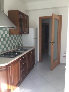 Kuchyňa alebo kuchynka v ubytovaní Webus Apartments