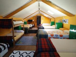 Postel nebo postele na pokoji v ubytování Albergue El Último Bucardo