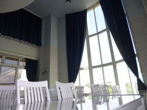 Posezení v ubytování Hotel Sha La La