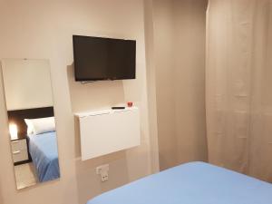 Cama o camas de una habitación en Vivienda Reina Victoria