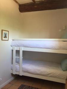 Letto o letti in una camera di Maison du Guit