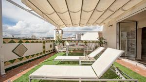 Balkón alebo terasa v ubytovaní Beach Penthouse