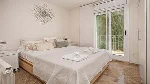 Posteľ alebo postele v izbe v ubytovaní Beach Penthouse