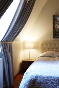 Postel nebo postele na pokoji v ubytování Old Riga Boutique Hotel "Vecriga"