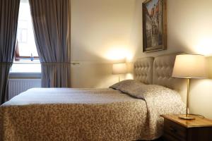 Postel nebo postele na pokoji v ubytování Old Riga Boutique Hotel "Vecriga"