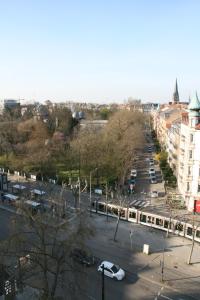 an aerial view of a city street with cars at L'Appartement de l'Observatoire in Strasbourg