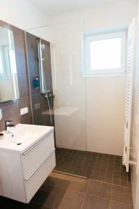 Aparthotel Heuberger的一间浴室