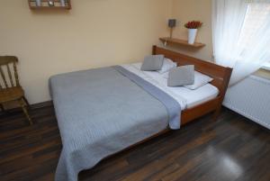 Posteľ alebo postele v izbe v ubytovaní Mazuria Apartamenty