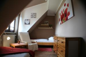 Кровать или кровати в номере Apartamenty Centrum Zakopane