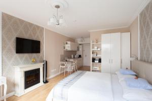 Rúm í herbergi á Sofie Apartments