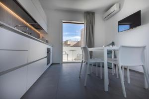 Kuchyňa alebo kuchynka v ubytovaní Le Ancore Luxury Apartments