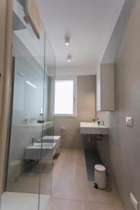 Kúpeľňa v ubytovaní Le Ancore Luxury Apartments