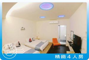 TV a/nebo společenská místnost v ubytování Kenting Blue Bay Inn