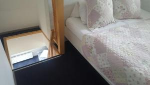 Rúm í herbergi á Villa Kiwi