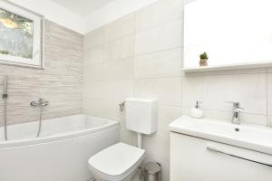 Ein Badezimmer in der Unterkunft Apartman Kresan