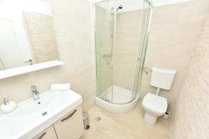 Ein Badezimmer in der Unterkunft Apartman Kresan