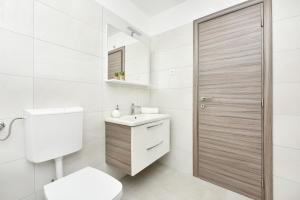 Ein Badezimmer in der Unterkunft Apartman Kresan